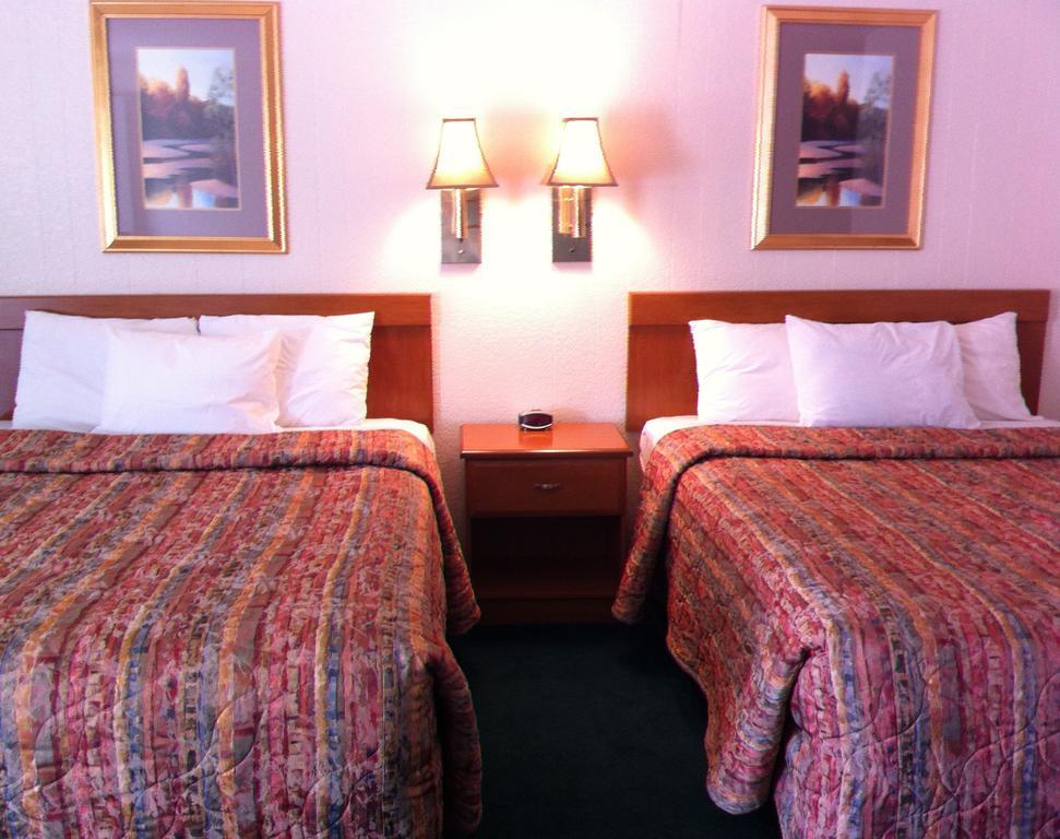 Legacy Inn Price Pokoj fotografie