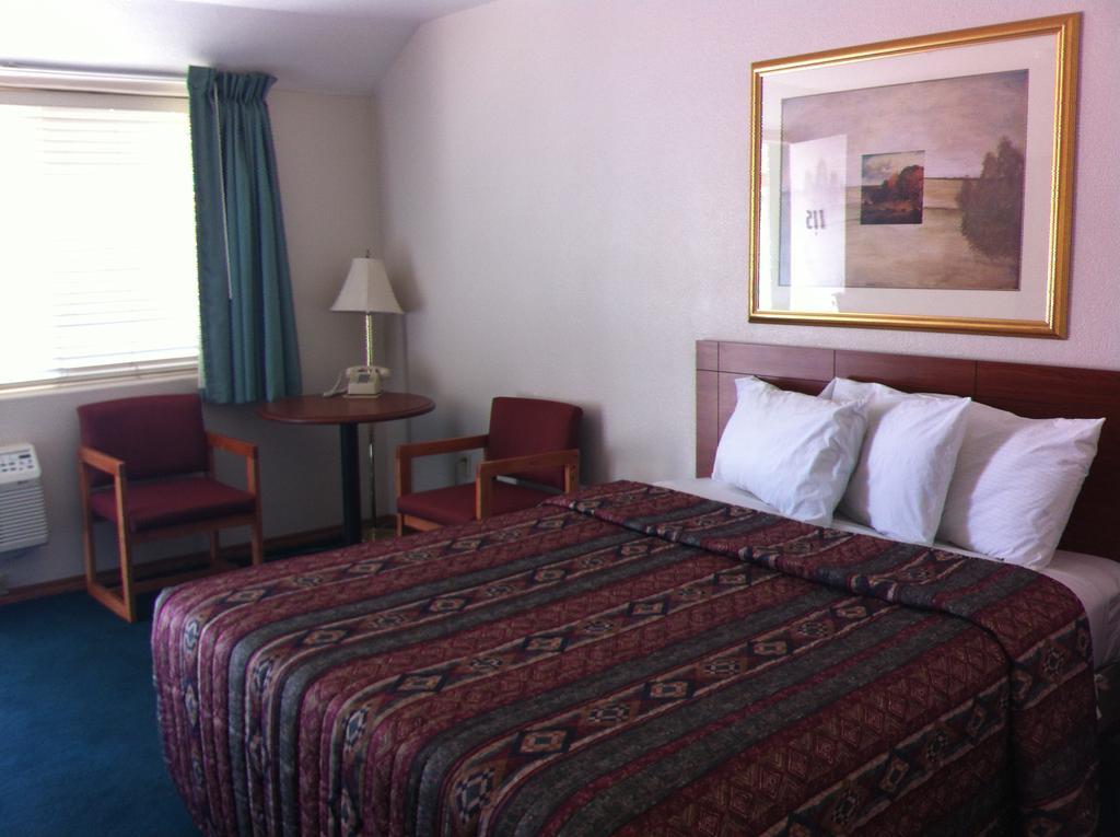Legacy Inn Price Pokoj fotografie